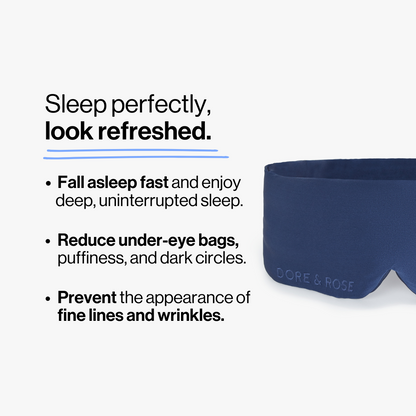 Half photo shot of Dore and Rose Luxury Soft Silk Sleeping Eye Mask in the color navy blue with its benefits listed beside it