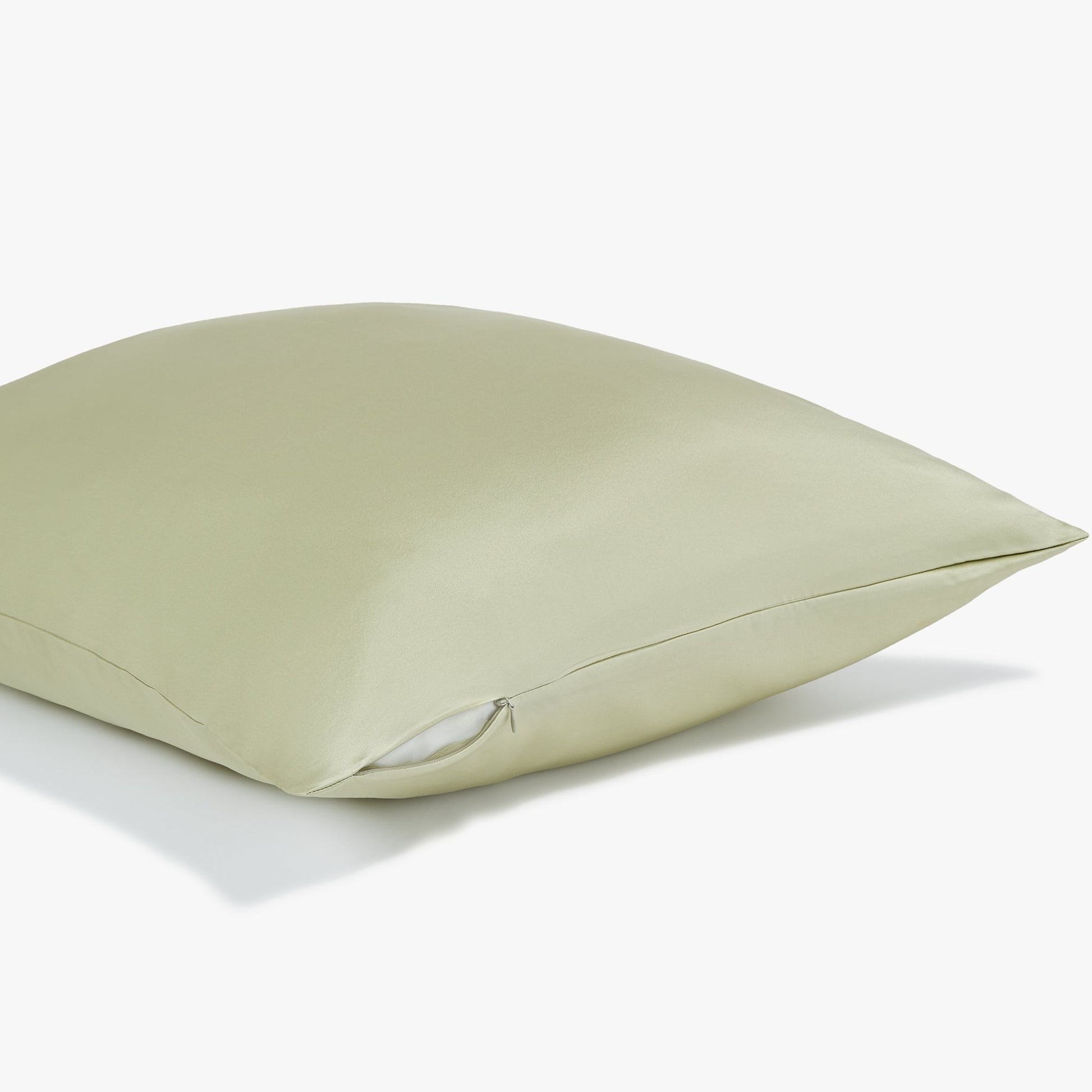 Side view of a olive pillowcase with zipper